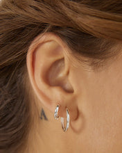 Load image into Gallery viewer, Arms Of Eve Shia Silver Huggie Earrings
